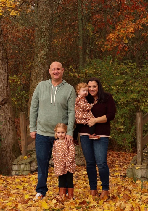 Dr. Michael Shaw with his wife, Monica, and their two daughters